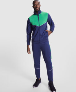 Man in blue and green athletic tracksuit