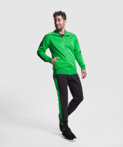 Man in green tracksuit and black pants
